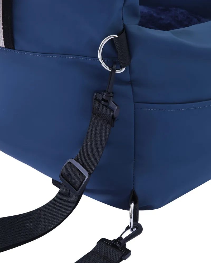 A metal clasp and strap on the back of the Dog Dock